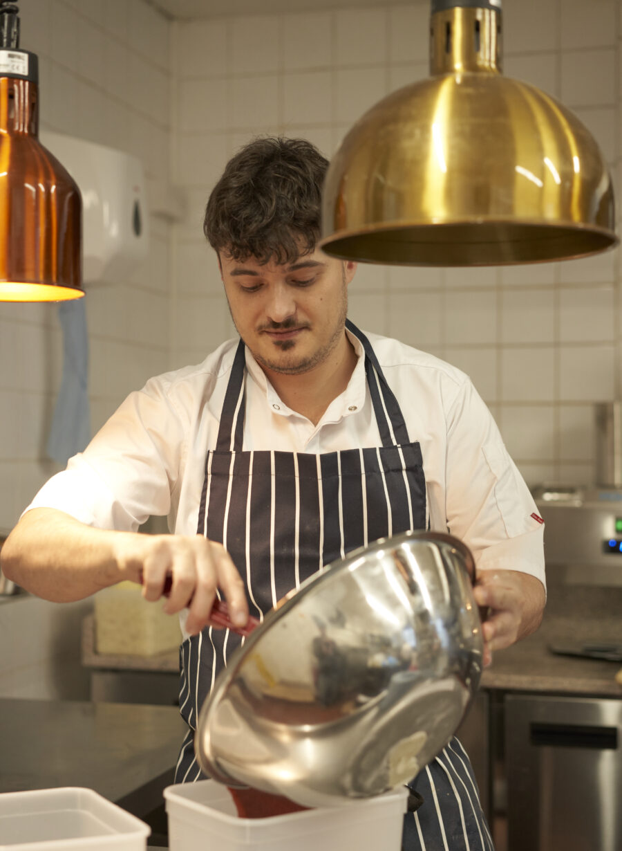 chef preparing food in kitchen