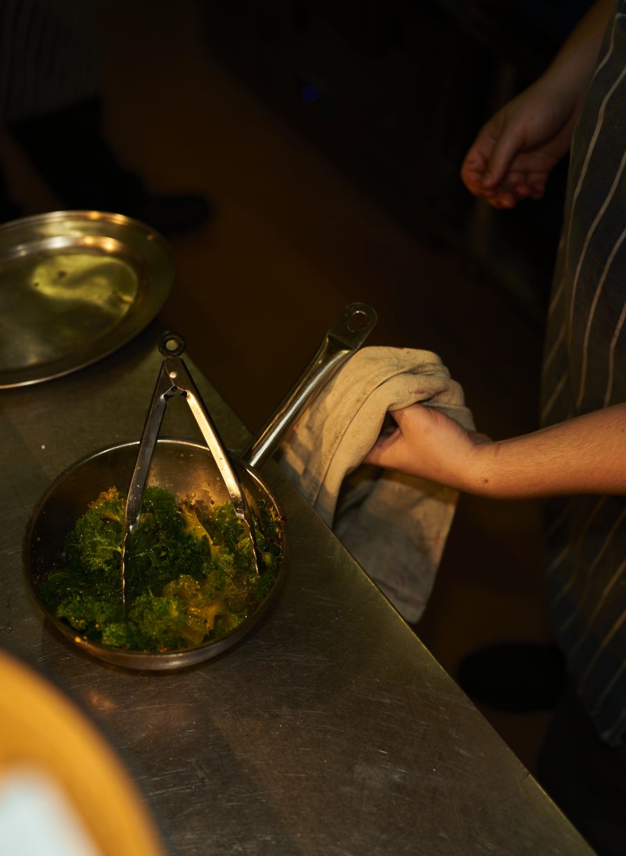 staff serving food at the bar